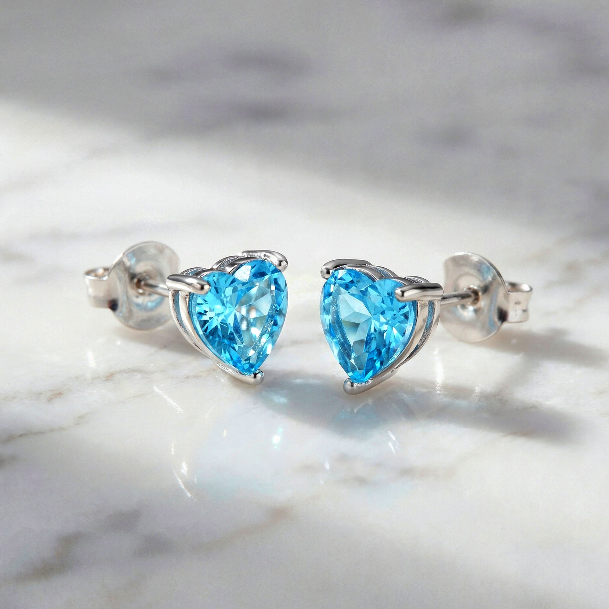 engelsrufer-ohrstecker-925er-silber-herz-shiny-mit-zirkonia-blau image 3