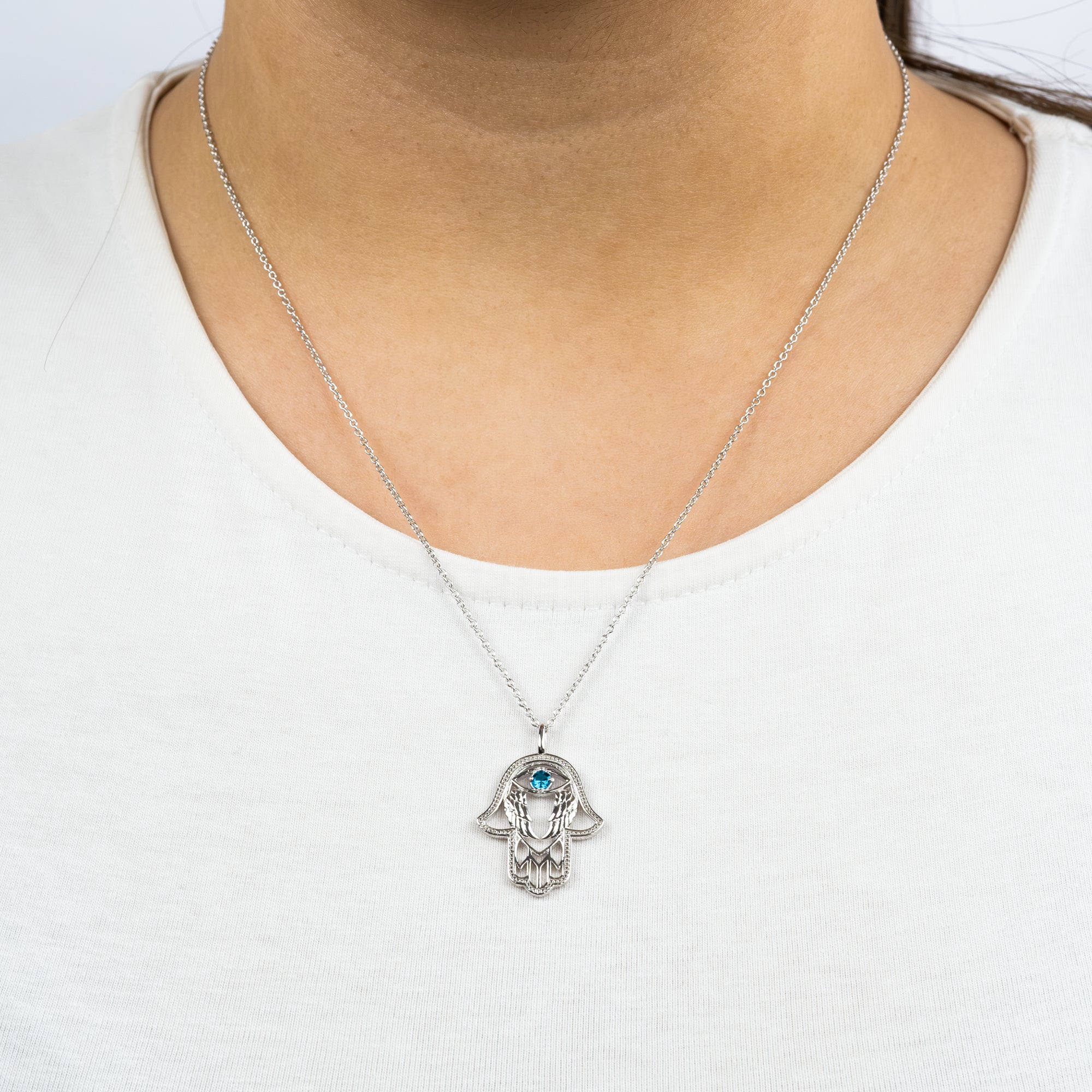 engelsrufer-halskette-925er-silber-hand-der-fatima-mit-zirkonia-blau image 2
