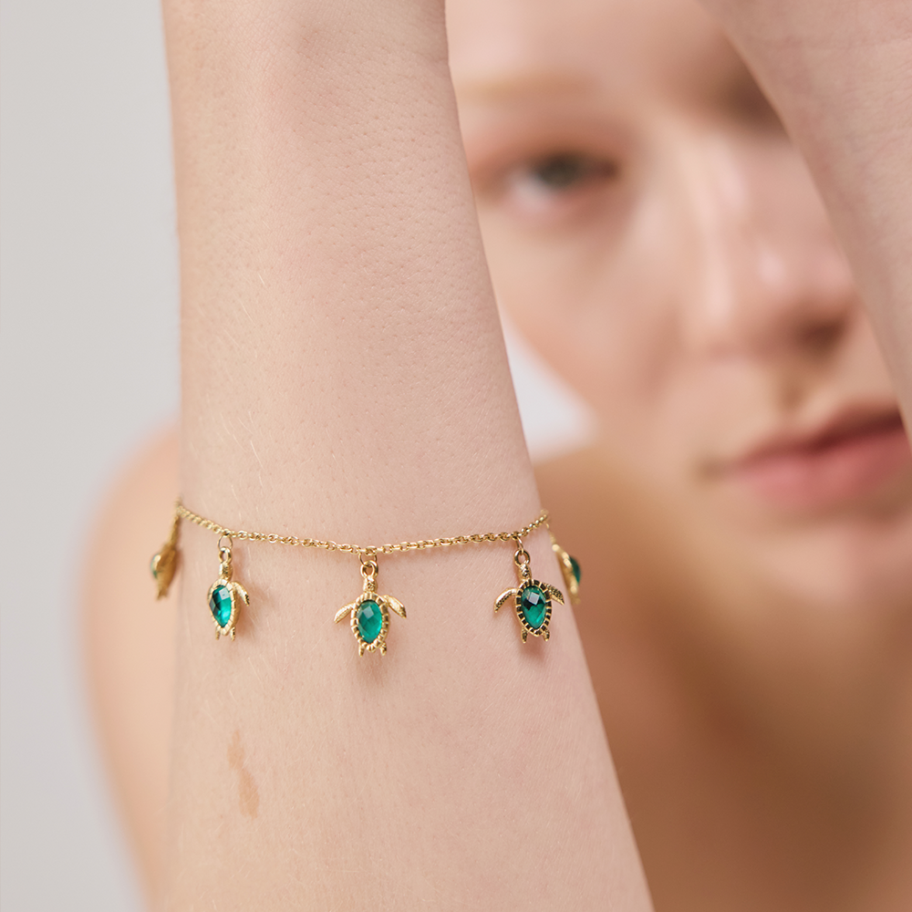 paul-hewitt-turtle-armkette-aquamarine-gold image 3
